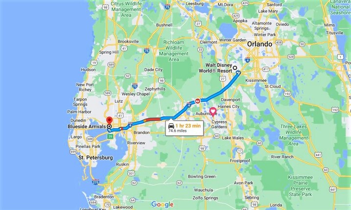 A map showing the Tampa to Disney World route with estimated driving distance and time.